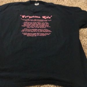 - Black “Forgotten Kids” Shirt